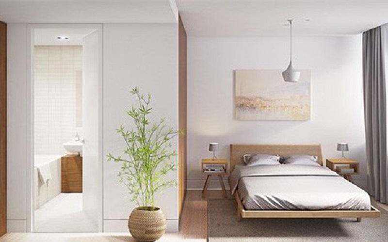 Phòng ngủ với tone trắng và các vật trang trí đơn giản tạo điểm nhấn